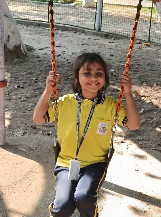 Happy Student on Swing